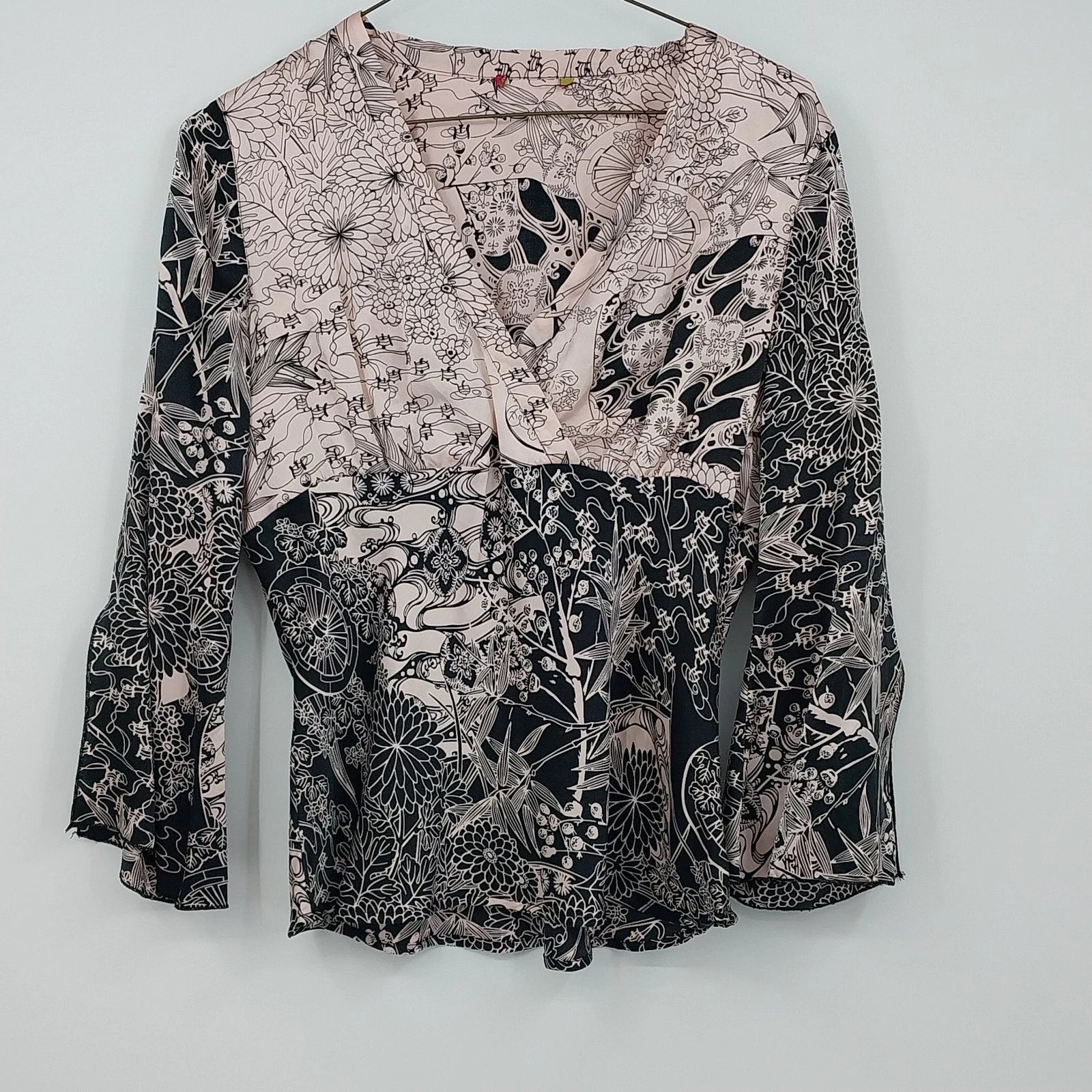 Women's black and cream floral layered V neck long sleeve blouse