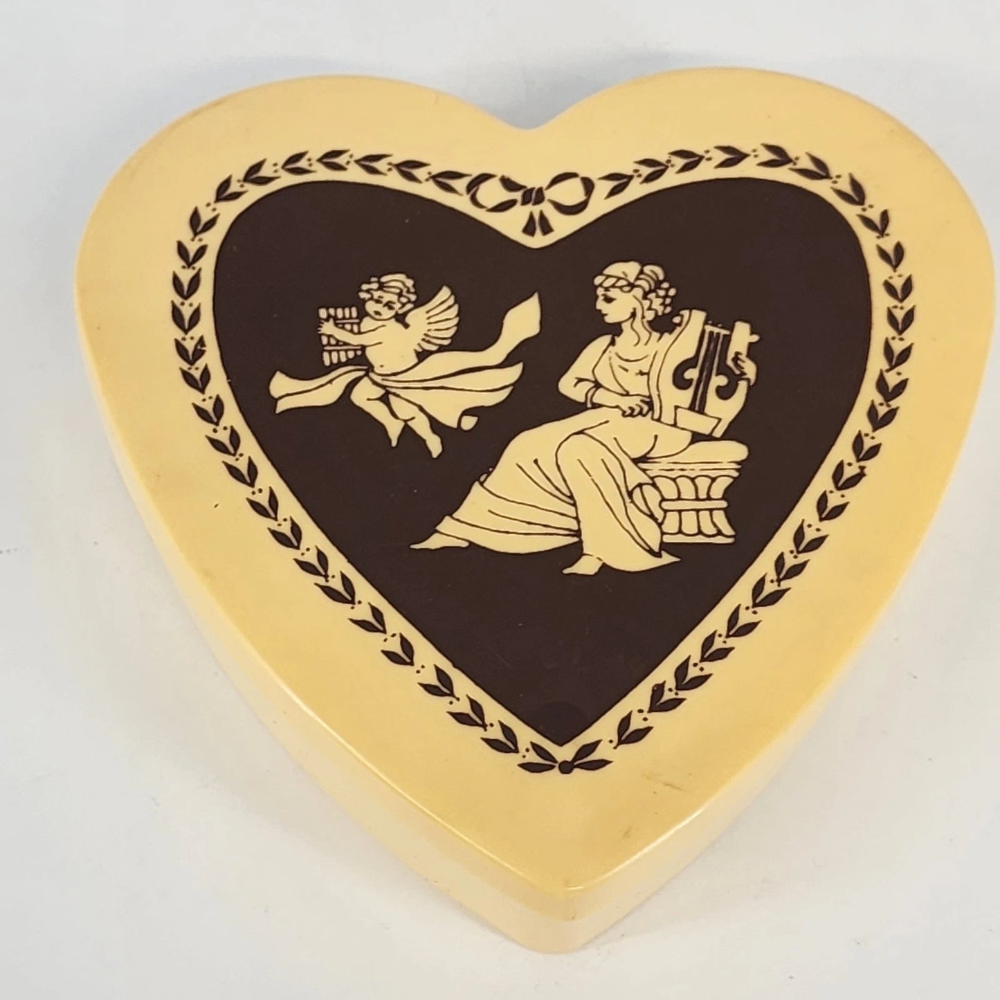 Yellow celluloid heart trinket box angels cupid