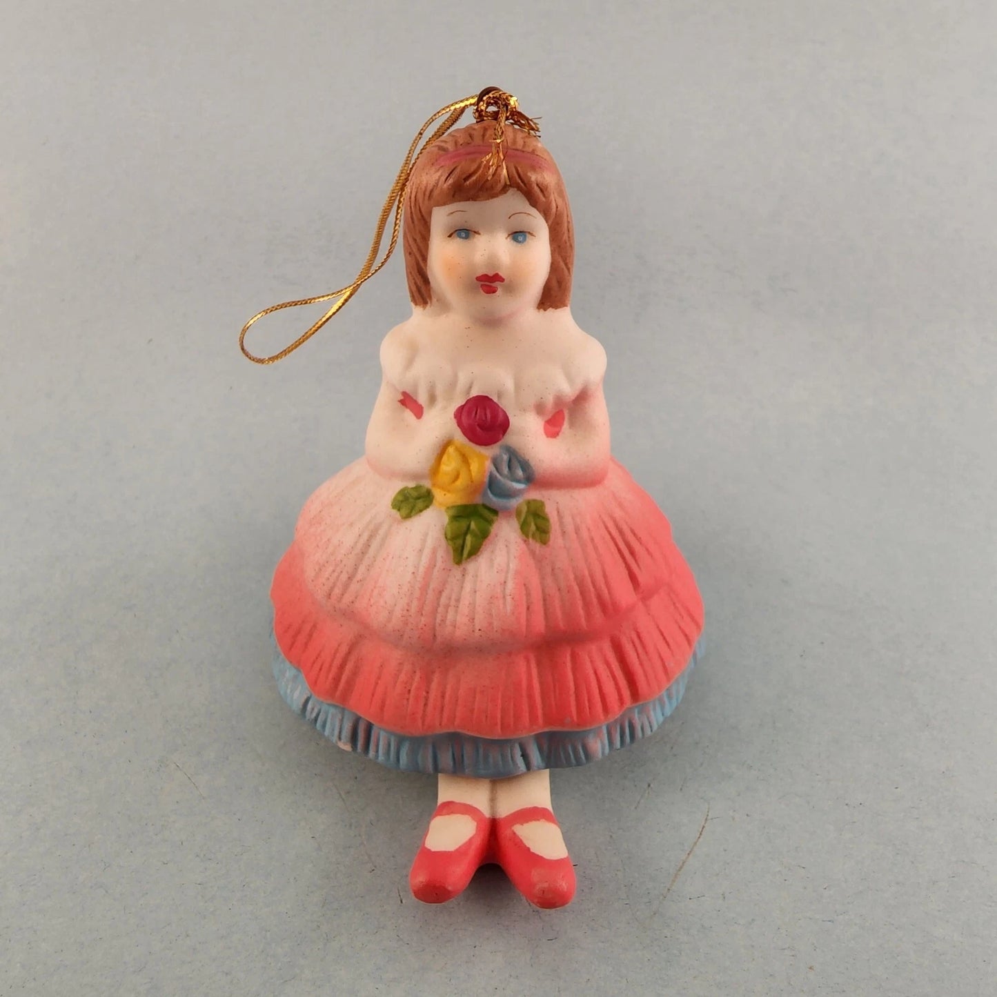Young girl porcelain Christmas bell ornament with hanging leg chimes