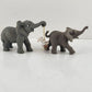 2 Miniature Gray Elephants One Swinging a White Bunny from it's Trunk 3.5" Long