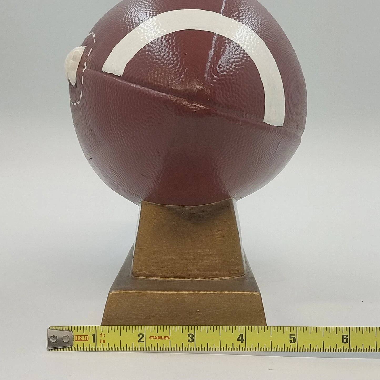 Ceramic Football Coin Bank Textured Sport Piggy Bank Brown on Pedestal Base 9.5"