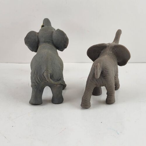 2 Miniature Gray Elephants One Swinging a White Bunny from it's Trunk 3.5" Long