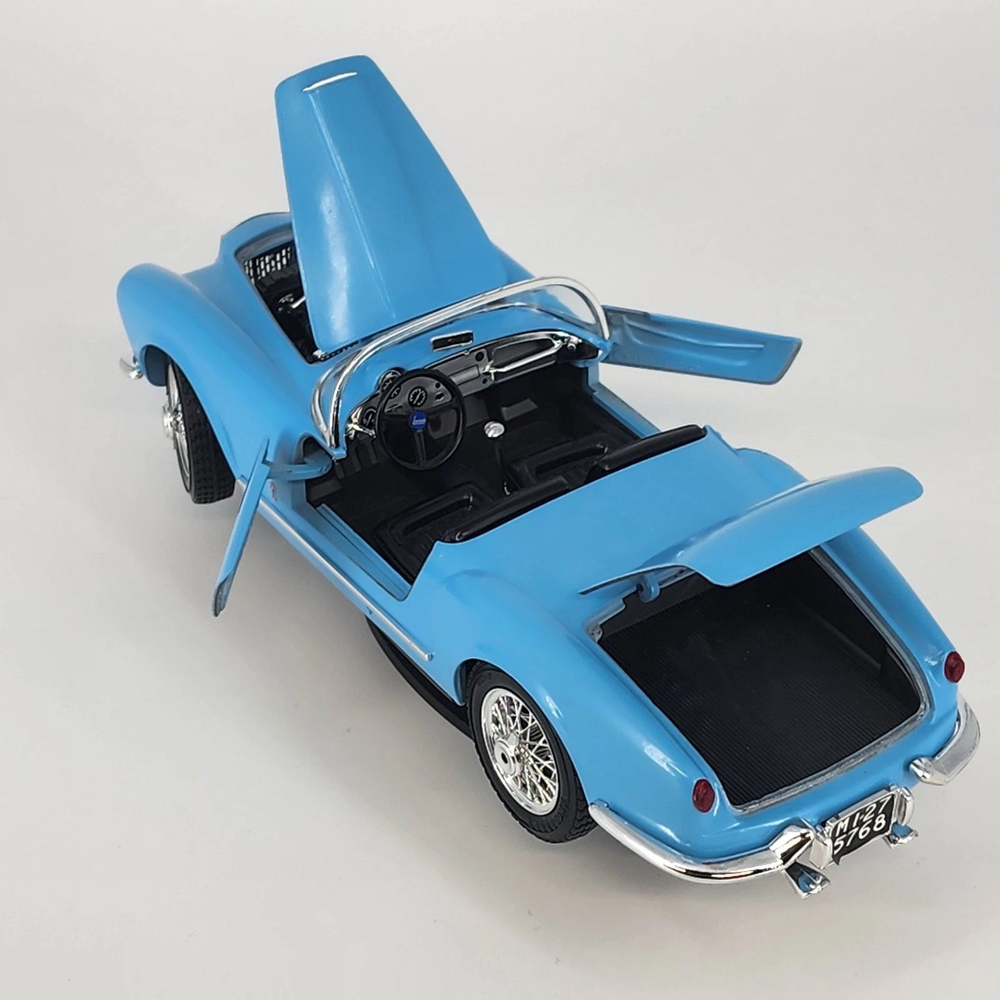 Bburago 1955 Lancia Aurelia B24 Spider 1:18 Diecast Model Light Blue Car Stand