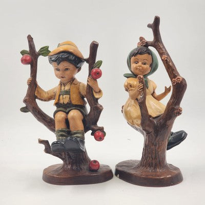 Vintage Ceramic Boy & Girl Figurine Pair – Sitting in Blooming Apple Trees – Hand-Painted Ceramic – Whimsical 11" Home Decor Set