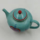 Jim Shore Teapot Candle Enesco Heartwood Creek Blue w Red Heart Ceramic Chip Lid
