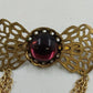 Gold Tone Filagree Metal Work & Cabochon Stone with Dangling Multi Chains Brooch