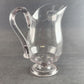 Heavy Crystal Manganese Glass Water Pitcher Fused Handle Design Footed Base Vtg