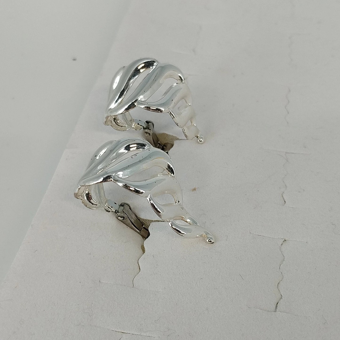 Napier Silver Tone Clip On Screw Back Earrings Swirl Half Hoop Polished Vintage