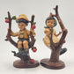 Vintage Ceramic Boy & Girl Figurine Pair – Sitting in Blooming Apple Trees – Hand-Painted Ceramic – Whimsical 11" Home Decor Set