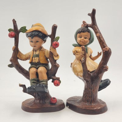 Vintage Ceramic Boy & Girl Figurine Pair – Sitting in Blooming Apple Trees – Hand-Painted Ceramic – Whimsical 11" Home Decor Set