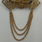 Gold Tone Filagree Metal Work & Cabochon Stone with Dangling Multi Chains Brooch
