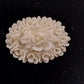 White Molded Celluloid Plastic Carved Style Brooch 1" Oval Flower Design