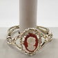 Gold Tone Hinged Bangle Bracelet with Red and White Lady Shell Cameo Charm 7"