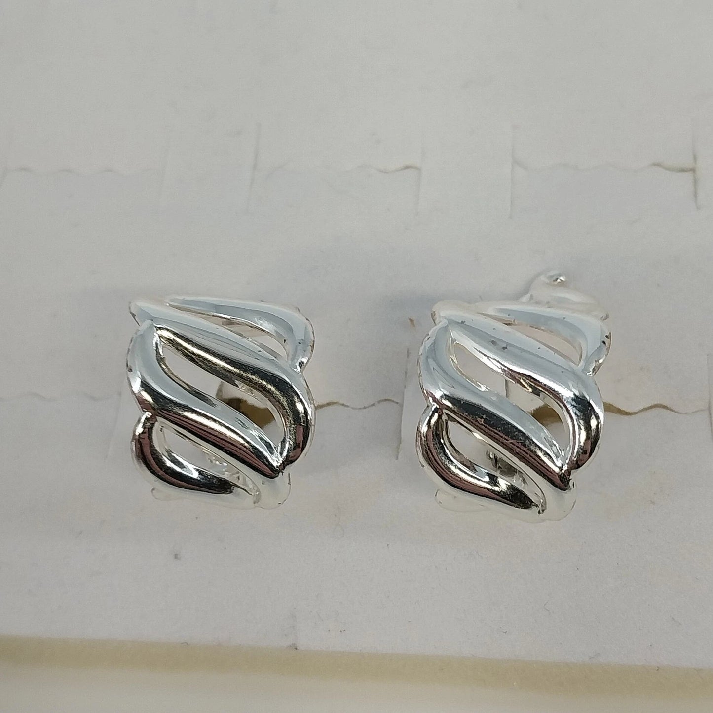 Napier Silver Tone Clip On Screw Back Earrings Swirl Half Hoop Polished Vintage