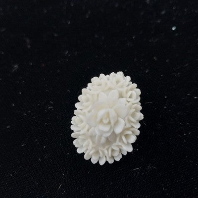 White Molded Celluloid Plastic Carved Style Brooch 1" Oval Flower Design