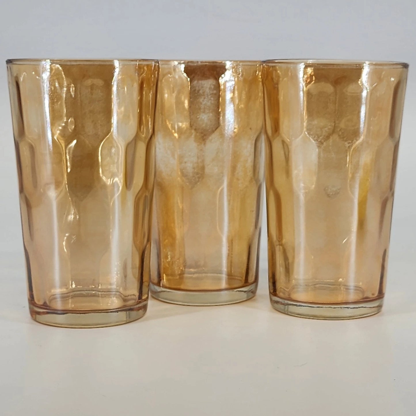 Jeannette Hex Optic Glasses Set of 3 Iridescent Marigold Carnival Glass 5" 8 oz