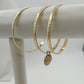 Three Set of Jewelry Bangles Thin Bracelets Gold Tone One with Gold Disc Dangle