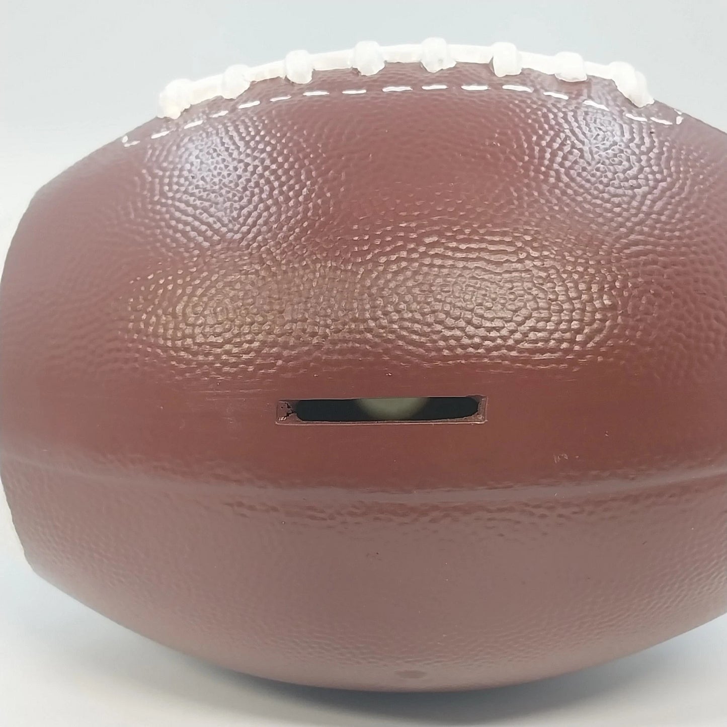 Ceramic Football Coin Bank Textured Sport Piggy Bank Brown on Pedestal Base 9.5"