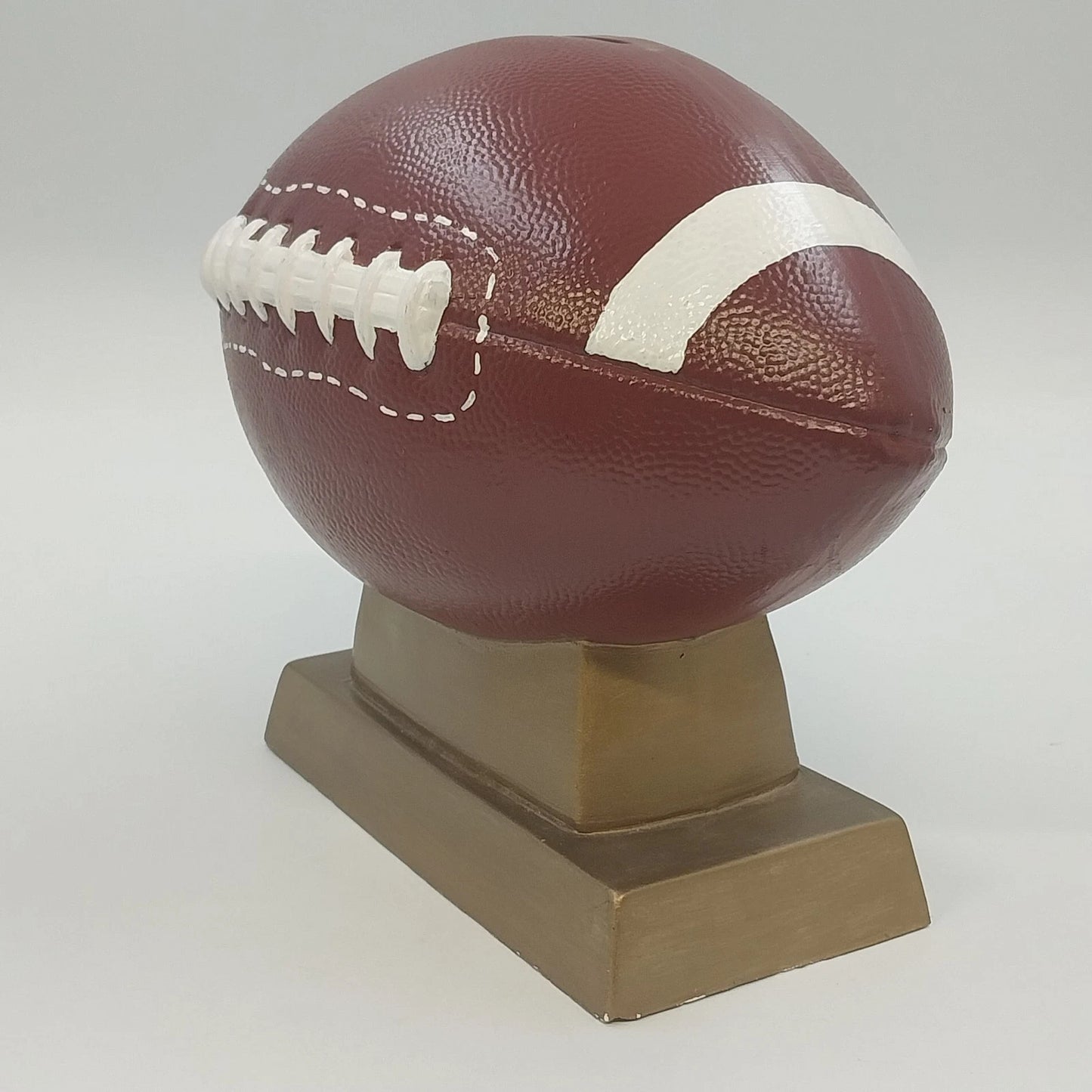 Ceramic Football Coin Bank Textured Sport Piggy Bank Brown on Pedestal Base 9.5"