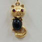Gem Craft Gold Tone Cat Pendant Necklace Black Cabochon Red Rhinestone Eyes
