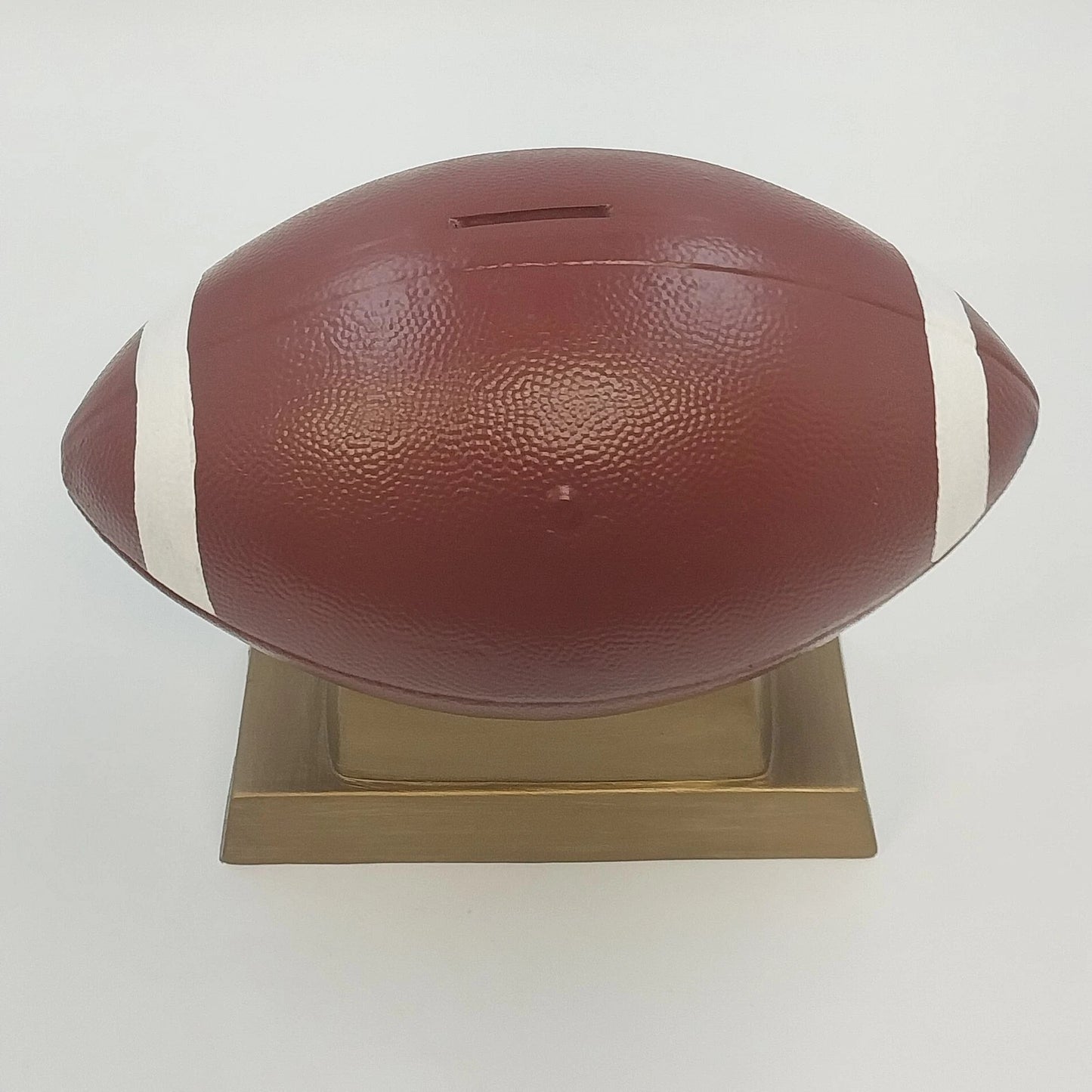 Ceramic Football Coin Bank Textured Sport Piggy Bank Brown on Pedestal Base 9.5"